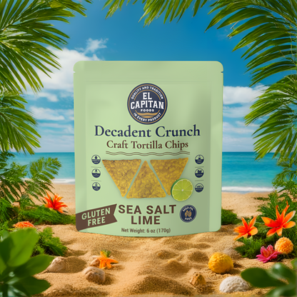 El Capitan Foods Decadent Crunch lime tortilla chips with sea salt on a beach background